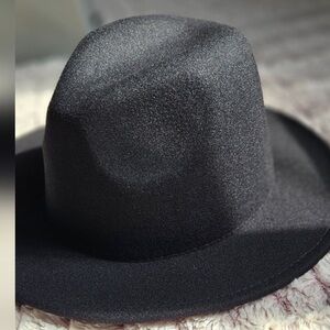 NWOT Black Fedora Hat. Polyester/cotton blend material.